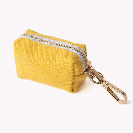 Yellow poop bag holder with zipper and clip for leash attachment