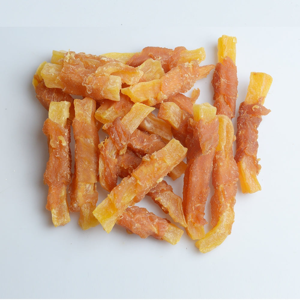 Jack PetPals Crafted Bite chicken sweet potato dog treats stacked on white background