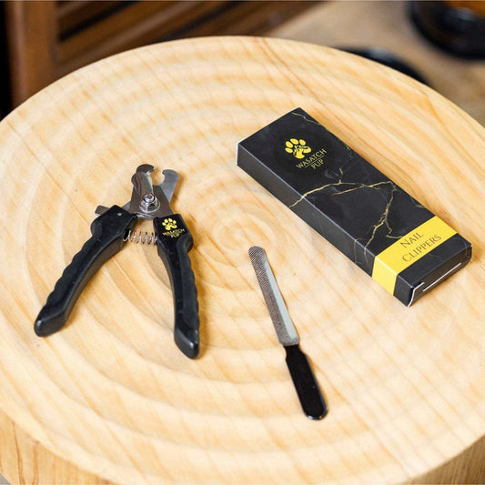 Dog nail clippers with sharp stainless steel blades and ergonomic non-slip handle with bonus nail file for grooming