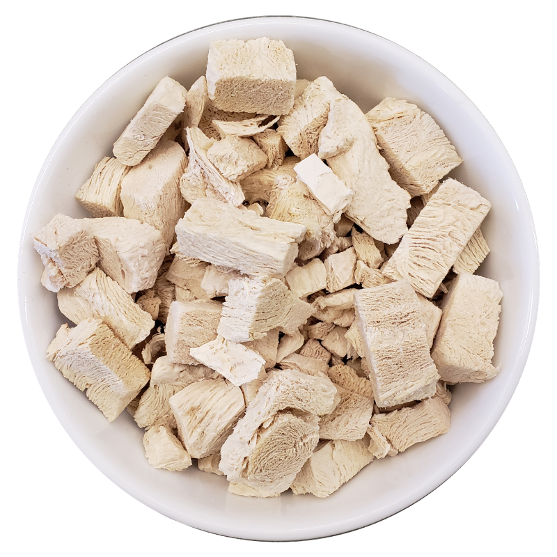 bowl of freeze dried chicken breast dog treats high protein single ingredient