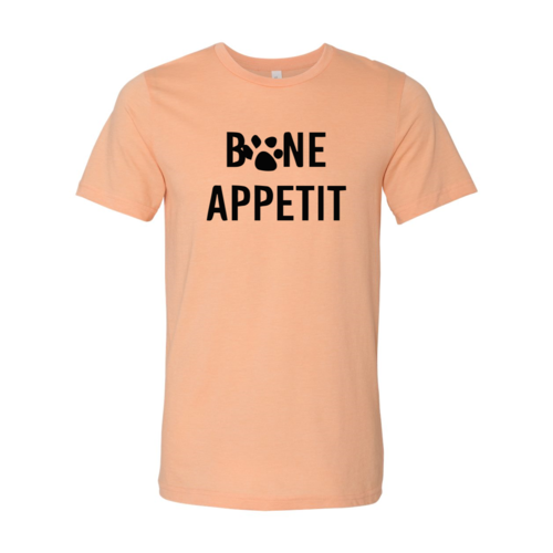 Bone Appetit T-Shirt in peach with black paw print design, soft ring spun cotton, Bella Canvas brand