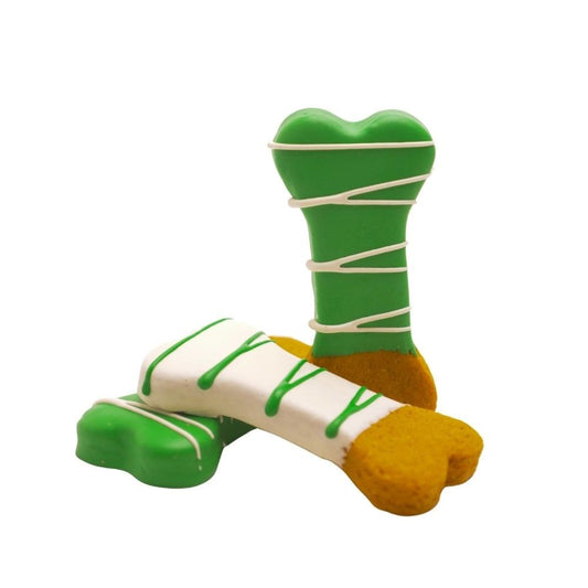 Dipped peanut butter dog bone treat with yogurt icing