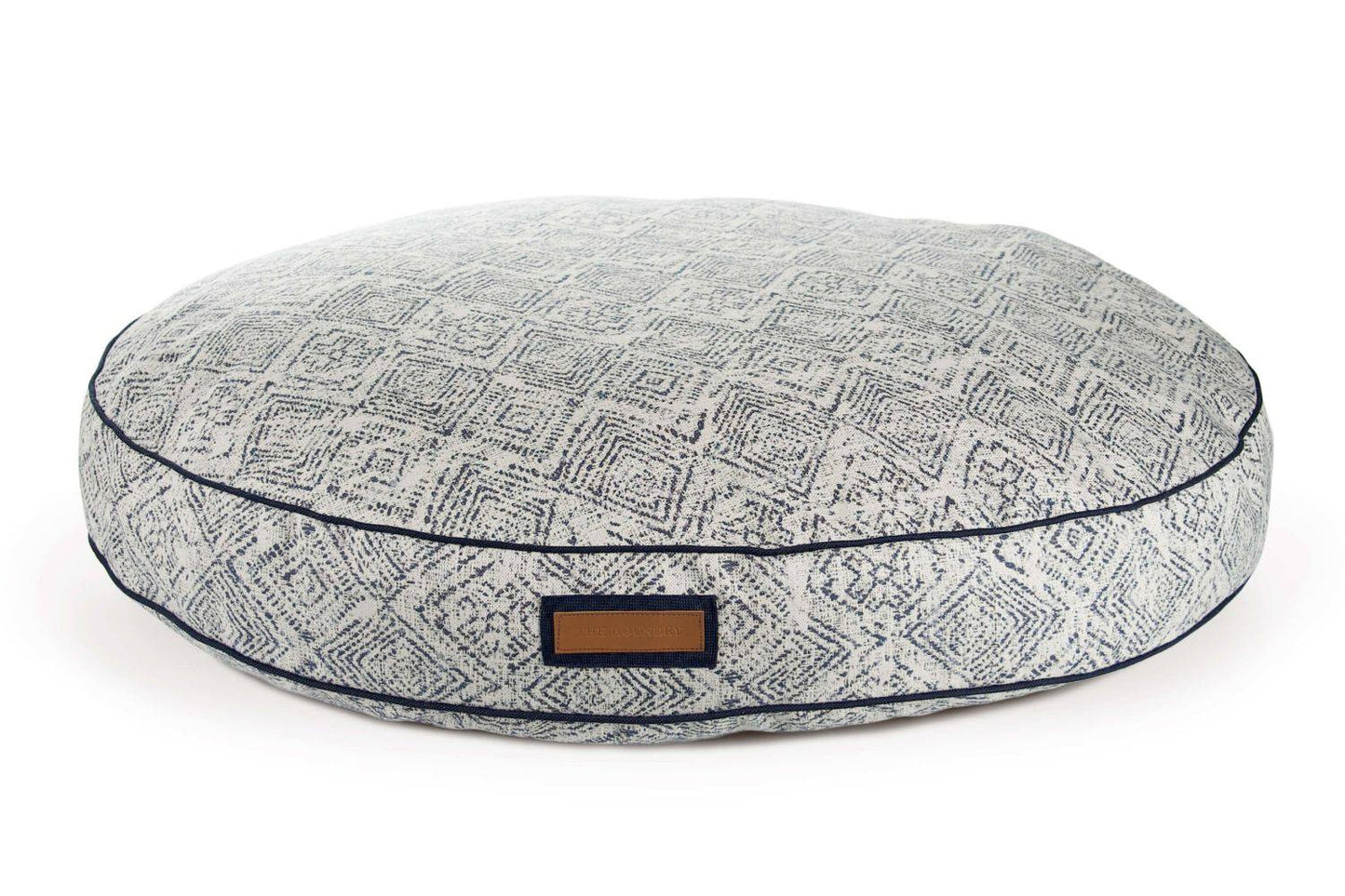 Round indigo Sunbrella fabric pet bed with plush recycled fill for dogs in multiple sizes