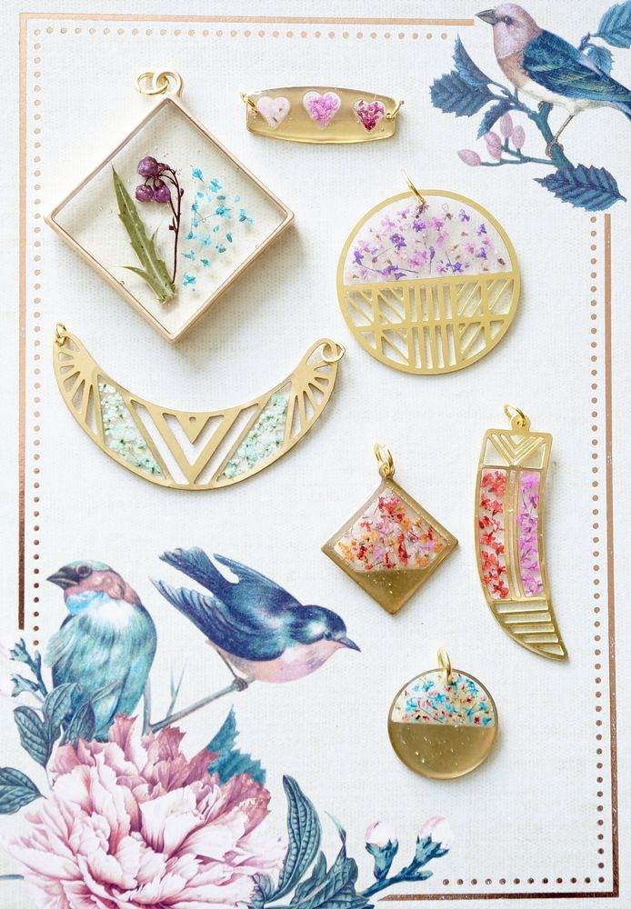 Gold dog necklace with real pressed flowers in blue and pink resin charm on gold chain