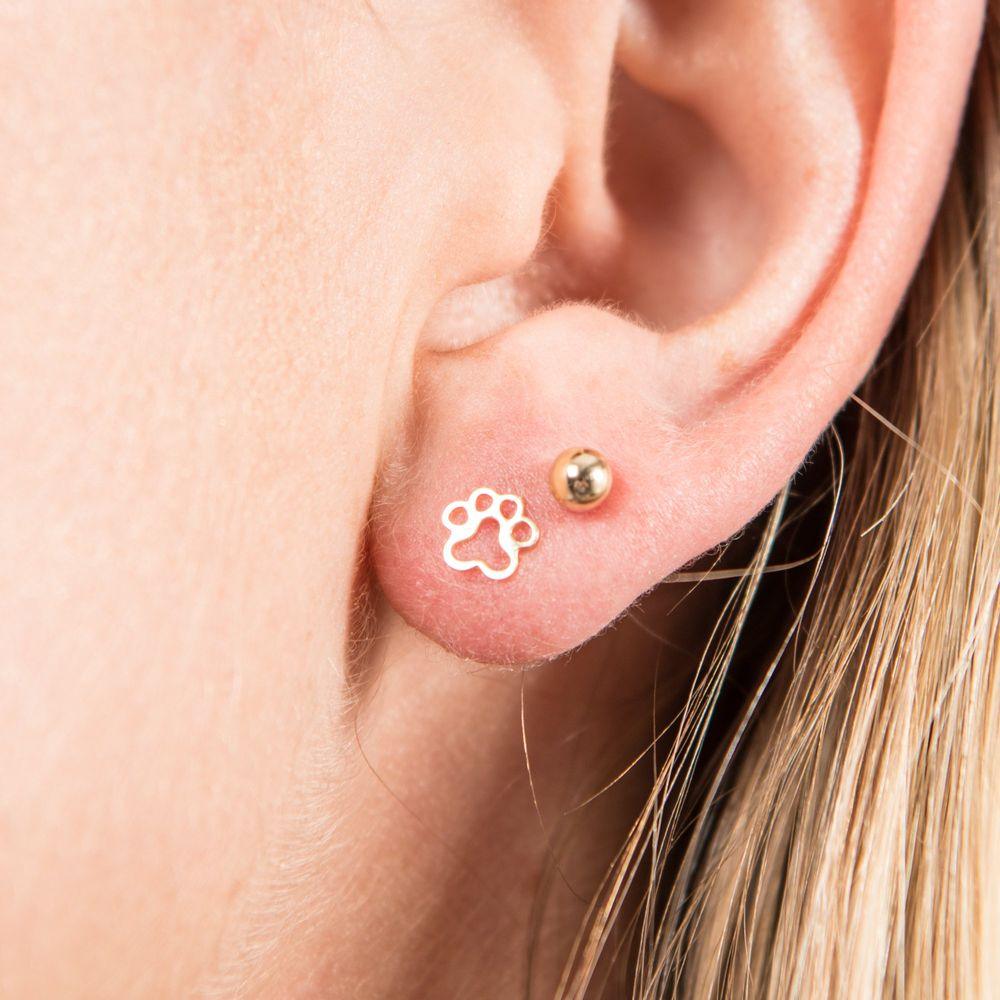 Pair of 14K solid gold dog paw studs with screw-on backpieces