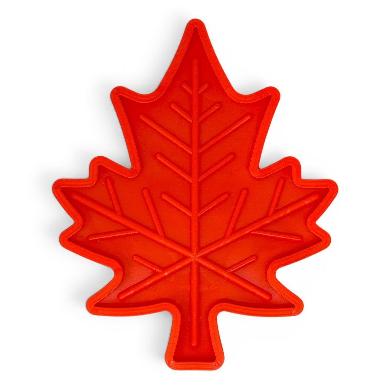 Green Canadian maple leaf-shaped indestructible nylon dog chew toy for heavy chewers