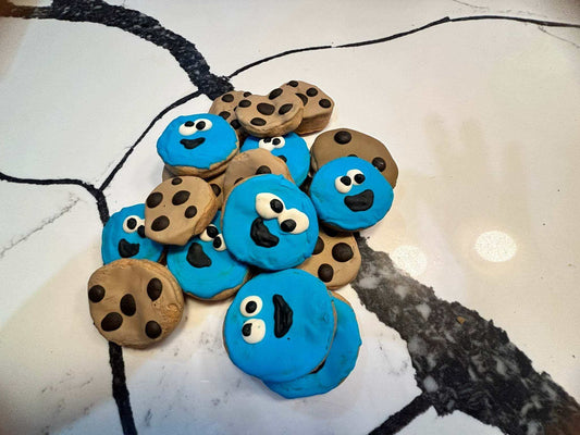 Organic peanut butter dog treats shaped like Cookie Monster with googly eyes
