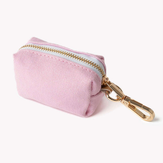 pink poop bag holder clipped on leash