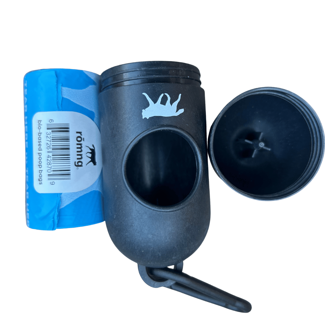 Bio-based dog poop bags roll with black dispenser and carabiner clip for eco-friendly pet waste cleanup