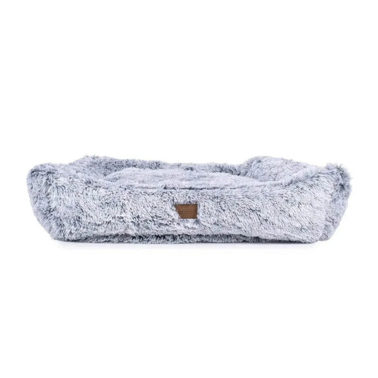 Luxurious Teddy Bear Kuddler Dog Bed with plush vegan faux fur and built-in bolster cushion for pet comfort and style