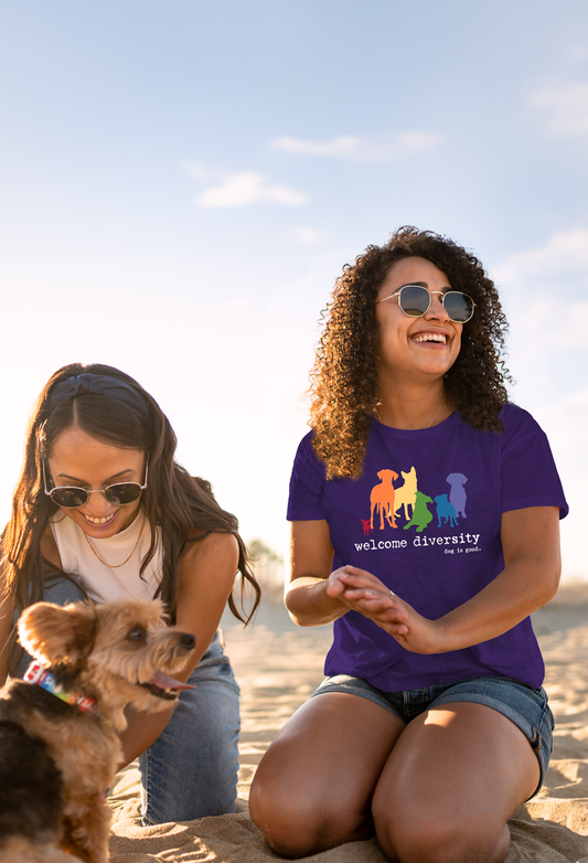 Purple unisex Welcome Diversity Pride T-shirt with colorful dog design