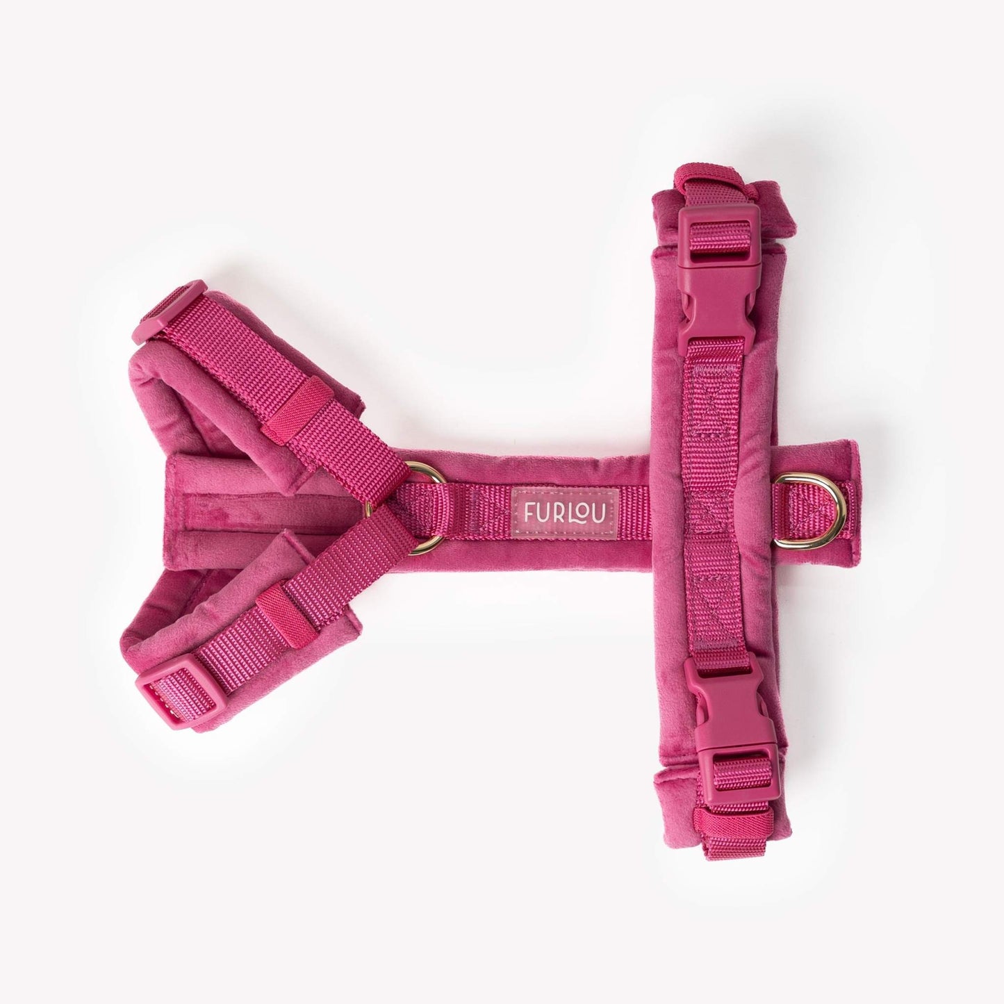Magenta velvet dog harness with adjustable straps and gold hardware for comfortable, stylish walks