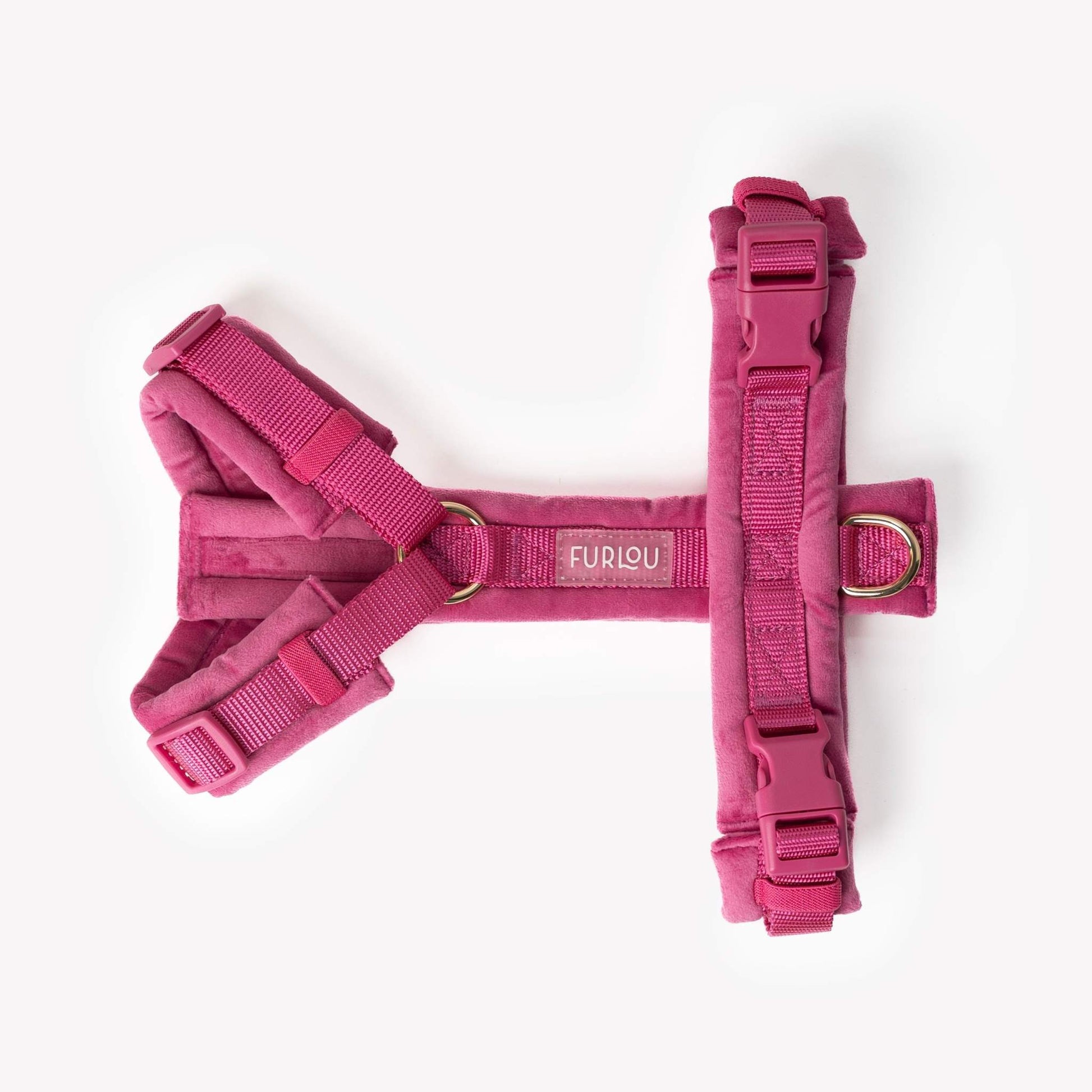 Magenta velvet dog harness with adjustable straps and gold hardware for comfortable, stylish walks