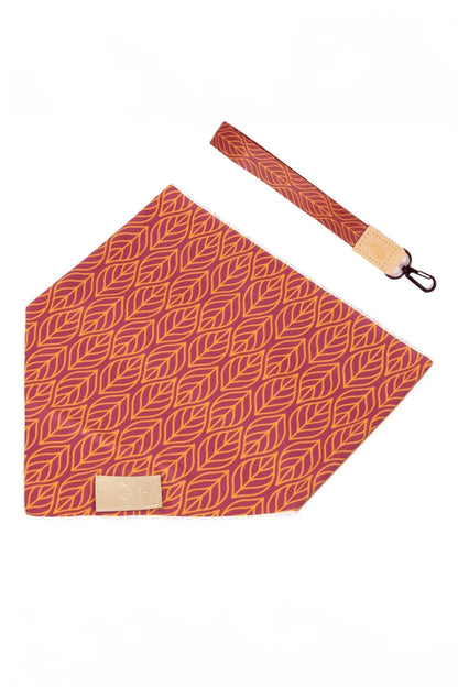 Twilight Trails vibrant dog bandana and matching vegan leather keychain set with red and orange leaf pattern