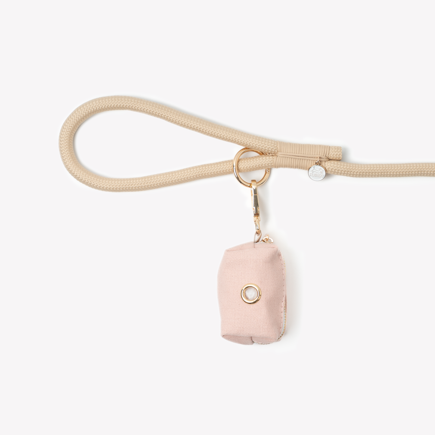 Powder Rose poop bag holder pouch clipped to beige dog leash
