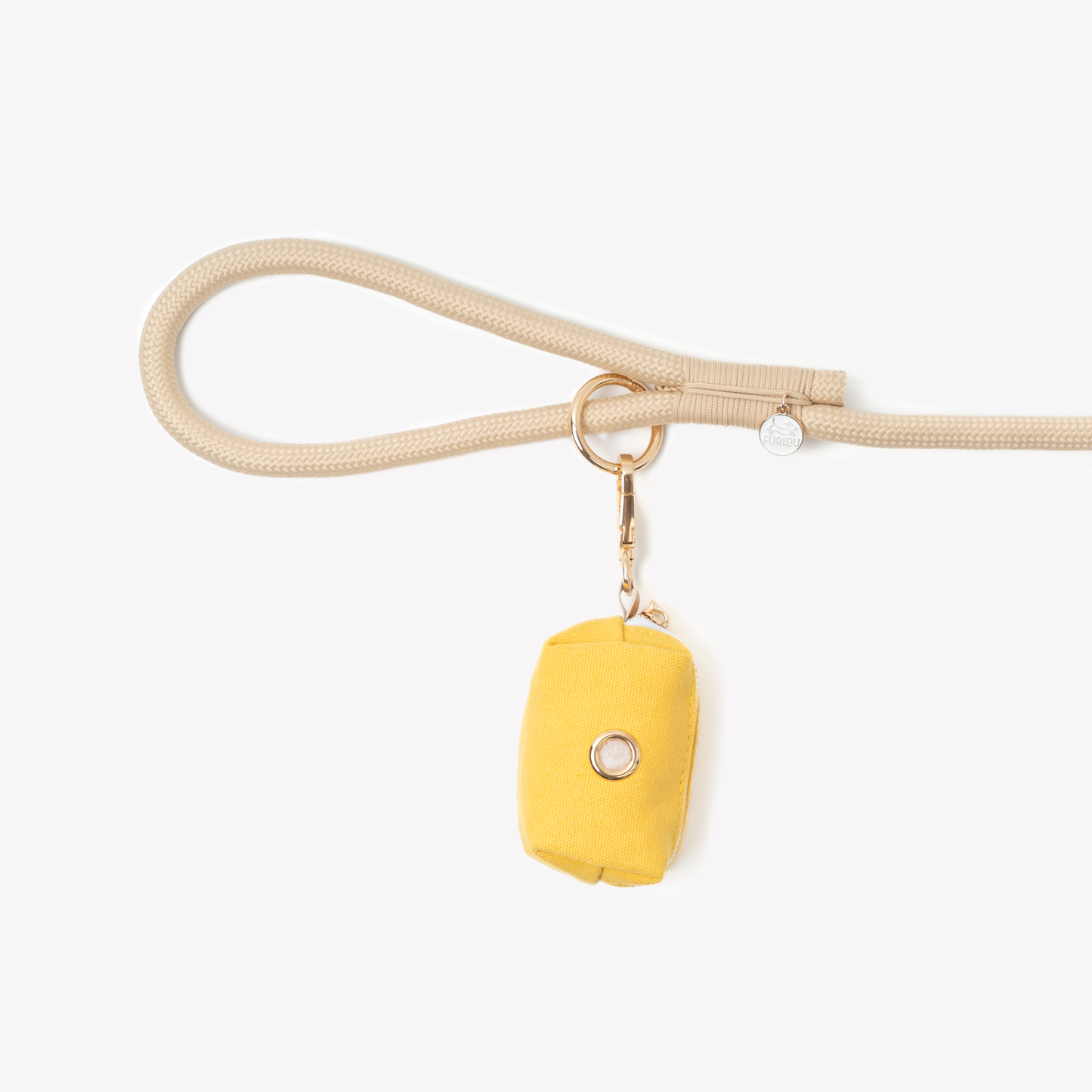 Yellow poop bag holder pouch attached to beige leash with metal clip and ring