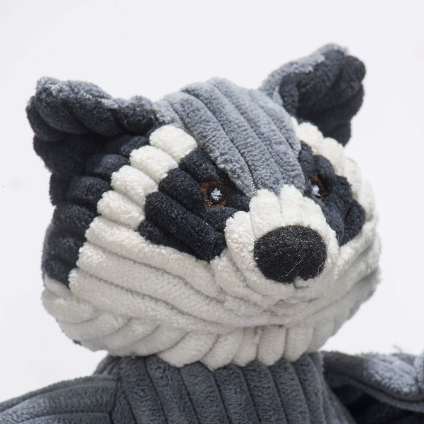 Reggie Raccoon Knottie® plush dog toy with durable Tuffut Technology and soft knotted design