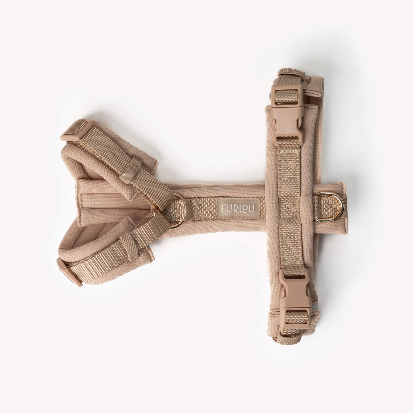Tan comfort dog harness with breathable padding and adjustable straps featuring gold hardware