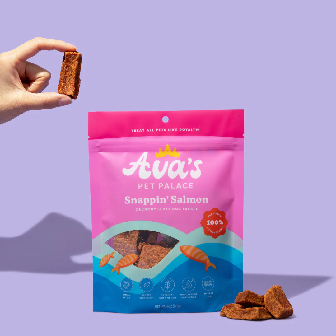 Ava's Pet Palace Snappin' Salmon Crunchy Jerky Dog Treats with wild-caught Sockeye salmon in pink and blue packaging