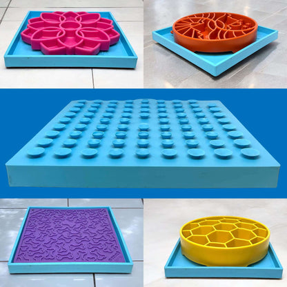 SodaPup Hold 'em suction cup holder with blue base securing colorful dog slow feeder bowls and lick mats for anti-slip feeding and enrichment, USA made.