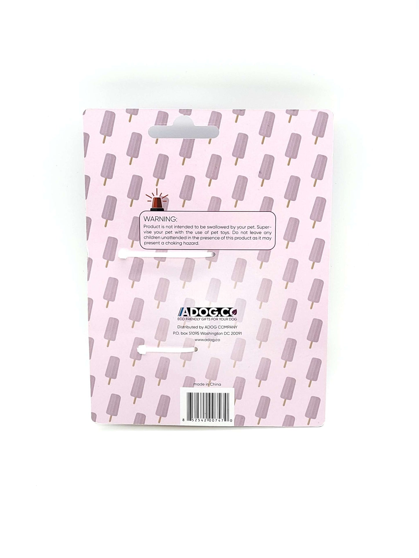 Packaging of Popsicle-Shaped Freezable Dog Toy with pink popsicle pattern background