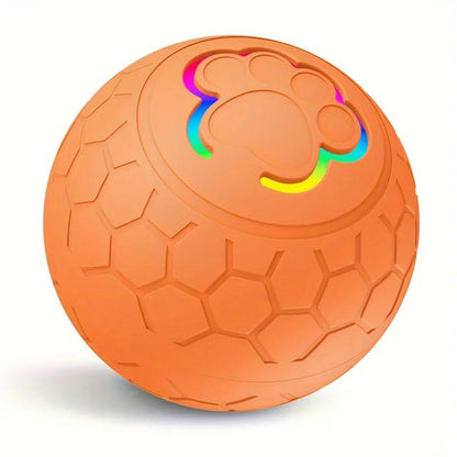 Orange interactive pet toy ball with RGB LED lights and hexagonal bite-resistant texture
