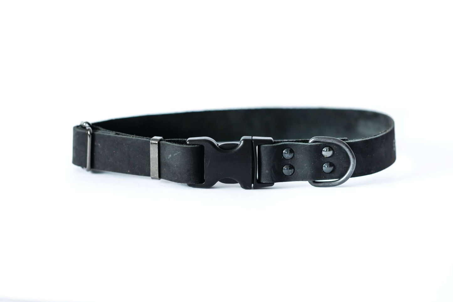 Sport style midnight black leather dog collar with quick-release black hardware and strong polyacetal YKK buckle.