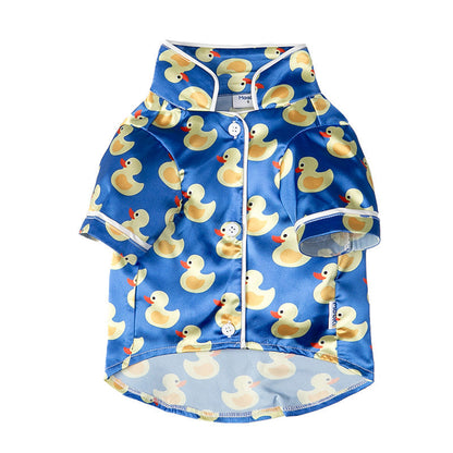 French Bulldog wearing soft pet silk duck pajamas with button closure and duck pattern