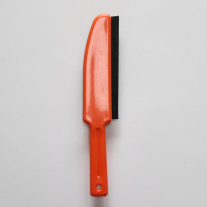 Orange pet hair removal mop with black rubber brush for removing dog and cat hair