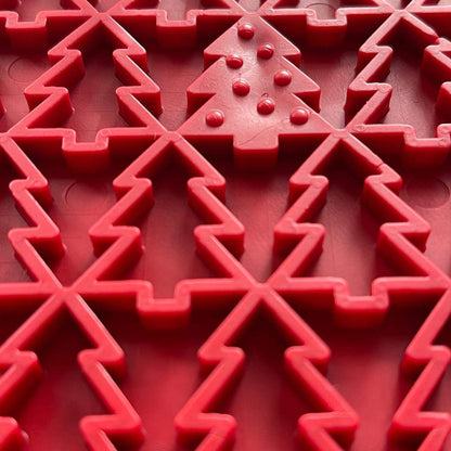 Red Peace Tree eMat with textured Christmas tree and peace symbol design for dog enrichment and anxiety relief