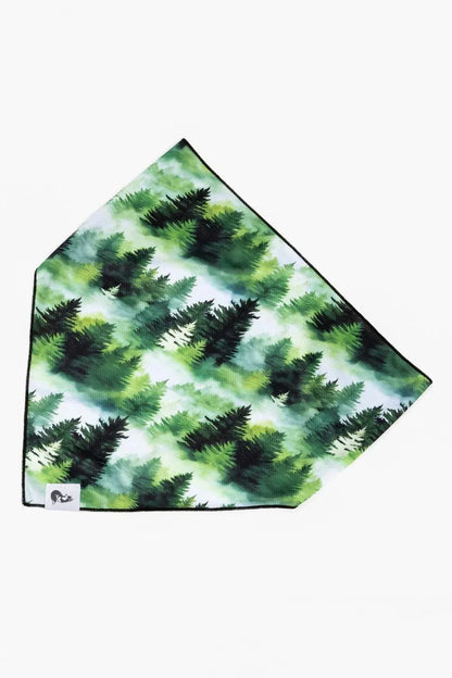 Evergreen Explorer dog bandana with green pine forest design and stretchy fabric