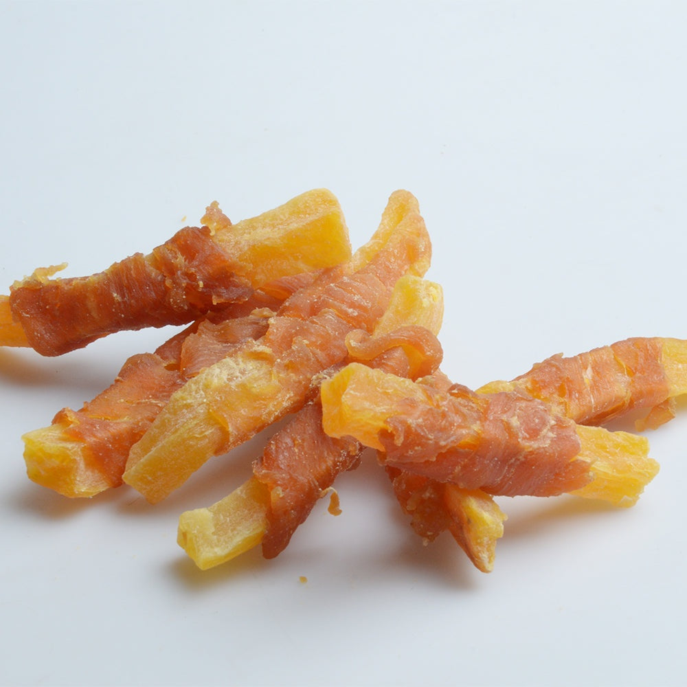 Jack PetPals Crafted Bite chicken sweet potato dog treats stacked on white background