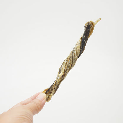 Jack PetPals Seafood Feast codfish skin treat chew held in hand, natural grain-free dog snack rich in Omega-3