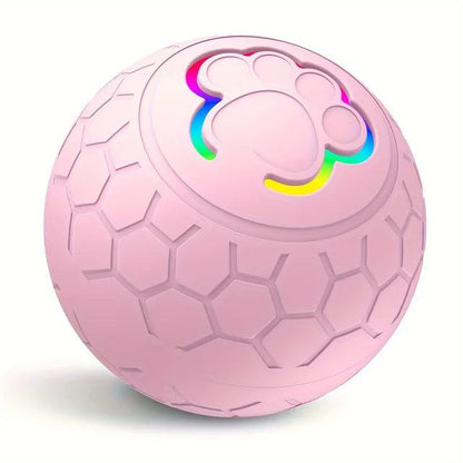 Pink interactive pet toy ball with hexagonal texture and RGB LED paw print design