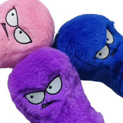 Octopus-shaped indestructible plush dog toy in purple, blue, and pink with squeaky sound and bite-resistant material