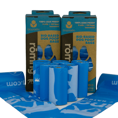 Eco-friendly bio-based dog poop bags in blue rolls with recycled packaging, leak-proof and biodegradable alternative for sustainable pet waste disposal