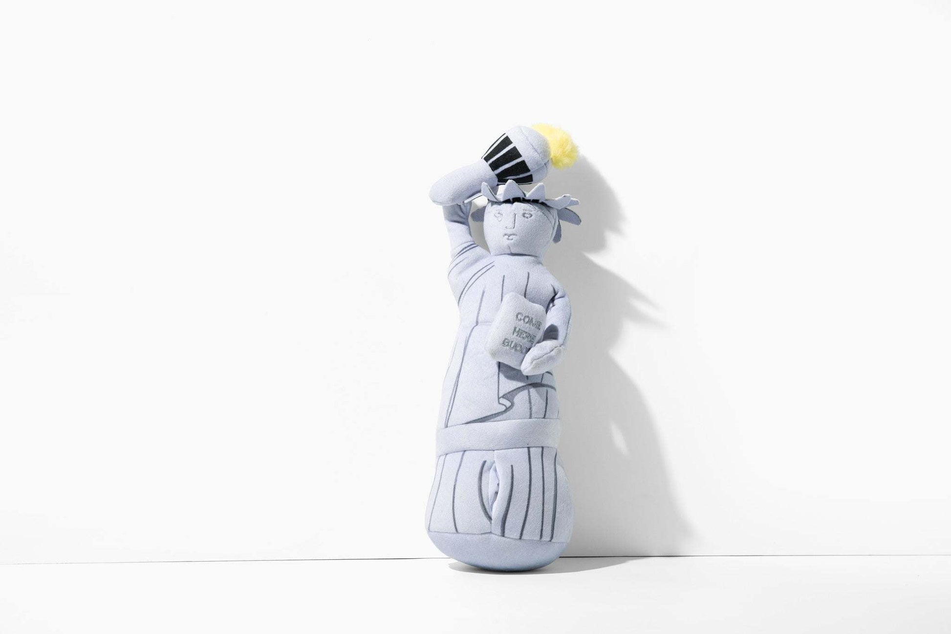 Liberty Nose Work Dog Toy shaped like Statue of Liberty with treat hide and squeaker, 12 inch plush for mental stimulation