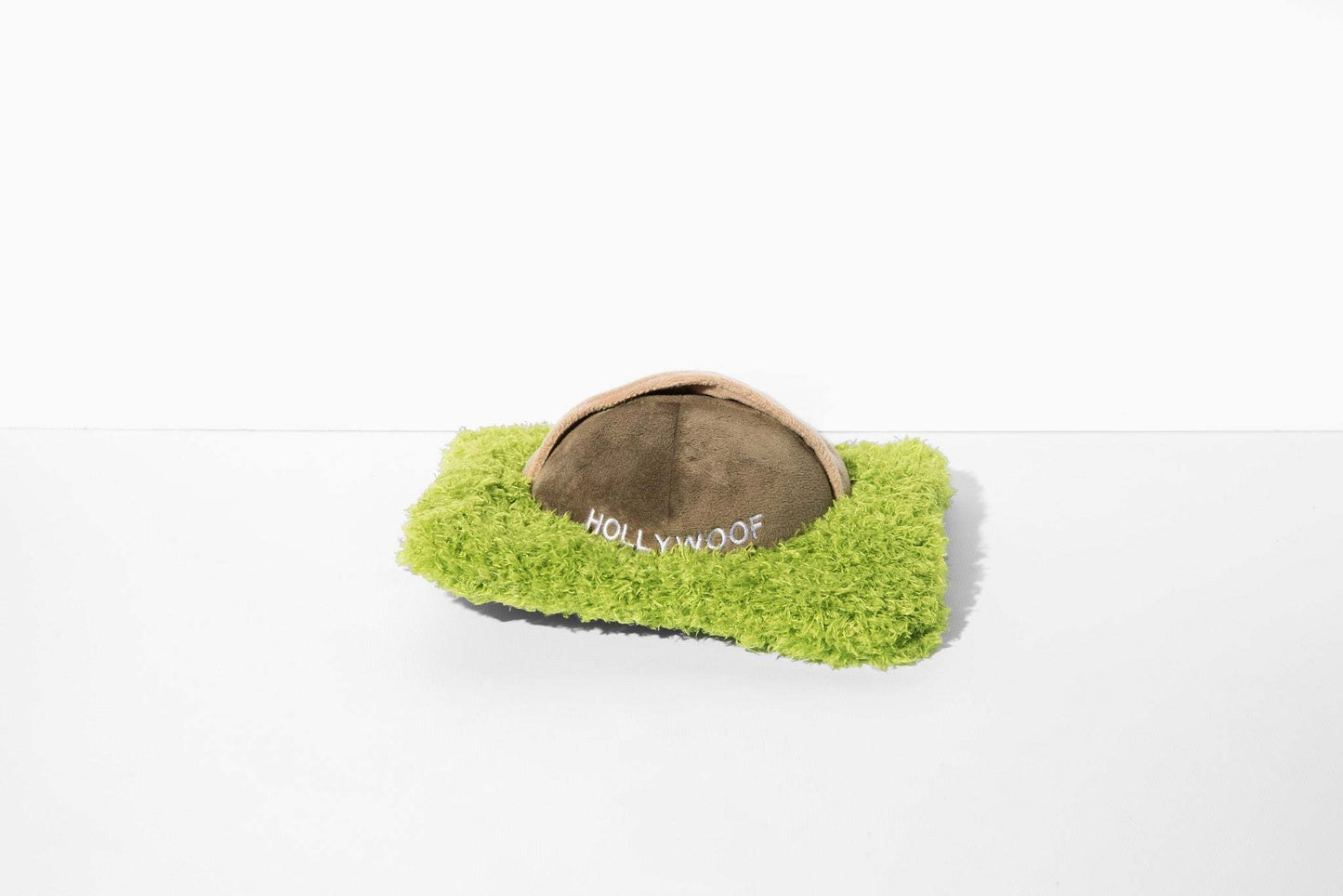 Hollywoof Nose Work Dog Toy with treat pocket, crinkle and squeak features on green plush base
