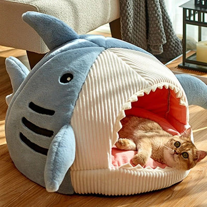 Big Mouth Shark Pet Nest in blue with cat inside on wooden floor
