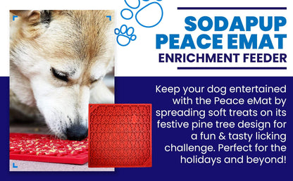 Dog licking red Peace Tree emat with textured pine tree design enrichment feeder by SodaPup for calming and mental stimulation