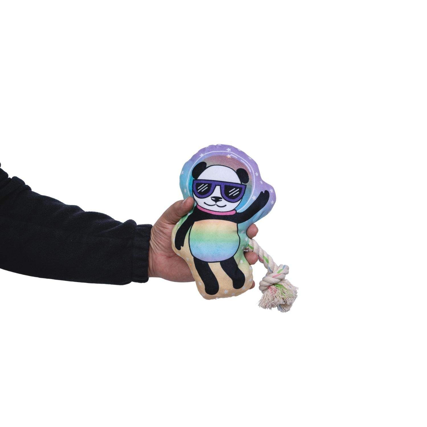 Hand holding colorful Space Panda Plush Dog Toy with squeaker and rope for interactive play