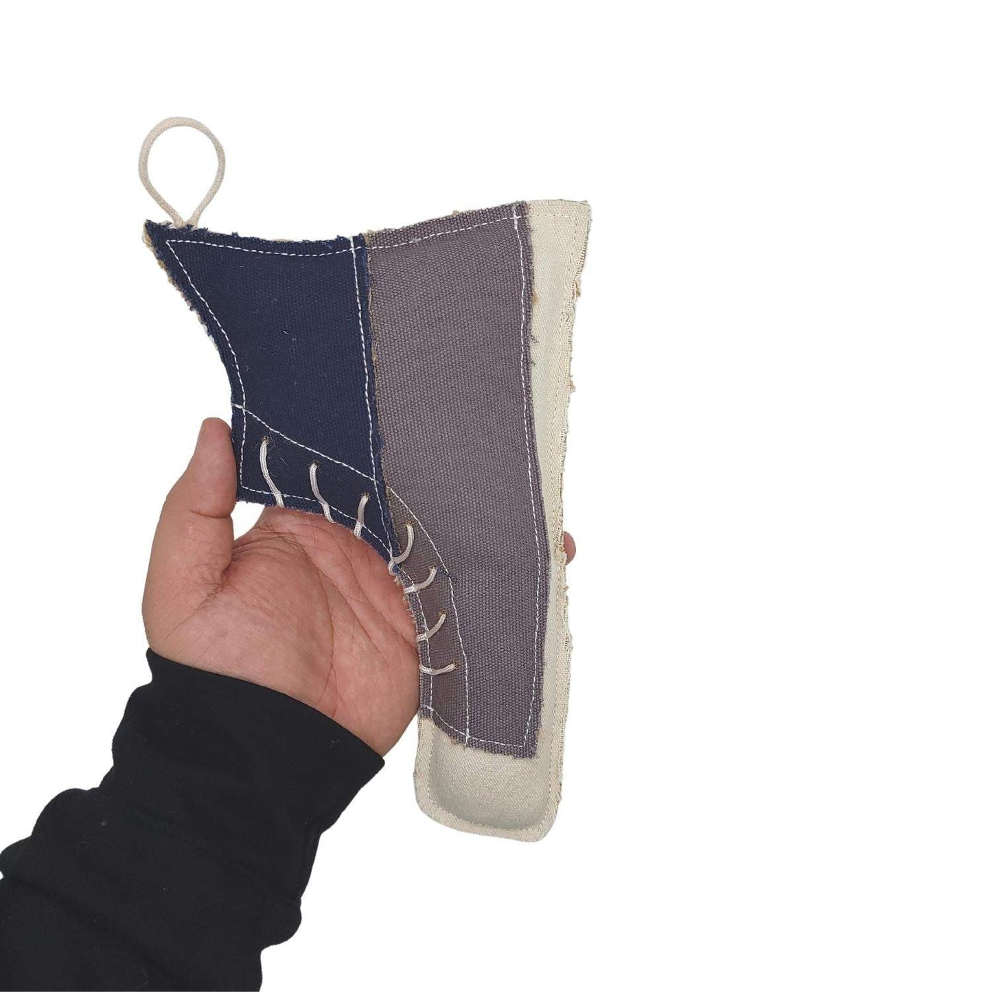 Country Living Canvas & Jute shoe-shaped dog chew toy held in hand, durable and non-toxic pet toy for small to medium dogs