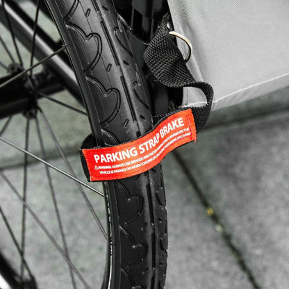 Close-up of parking strap brake on 2-In-1 Pet Bike Trailer bike wheel