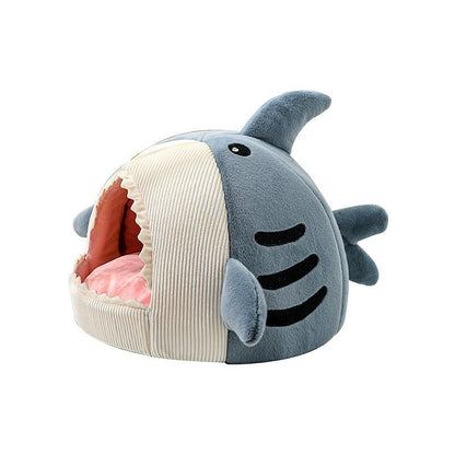 Big Mouth Shark Pet Nest in blue fabric with soft pink interior, cozy semi-closed design for cats and dogs