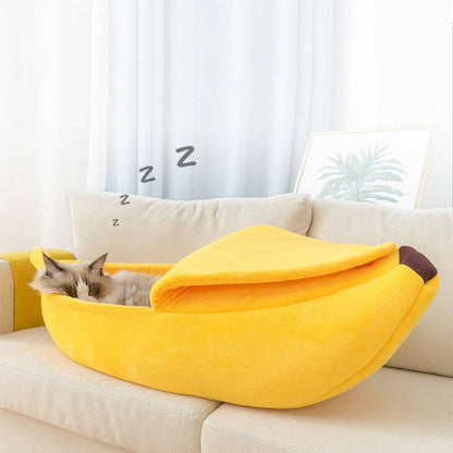 Yellow banana shaped pet bed with sleeping cat cozy soft plush cushion for cats and small dogs