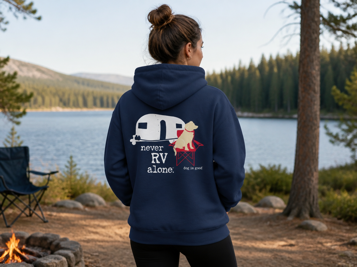 Navy zip hoodie with "Never RV Alone" design, soft heavyweight fabric, unisex cut, perfect for RV trips