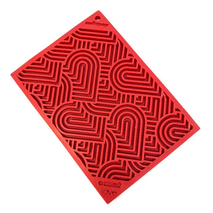 Red heart-shaped textured dog lick mat for calming mental stimulation and slow feeding Love eMat Enrichment