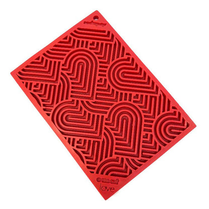 Red heart-shaped textured dog lick mat for calming mental stimulation and slow feeding Love eMat Enrichment