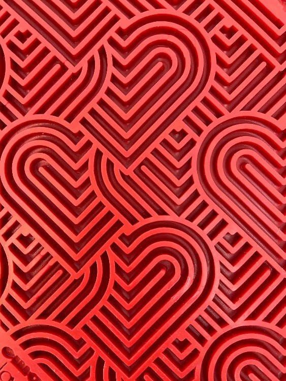 Red Love eMat Enrichment lick mat with textured heart pattern for dogs and cats