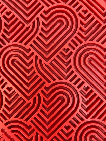 Red Love eMat Enrichment lick mat with textured heart pattern for dogs and cats